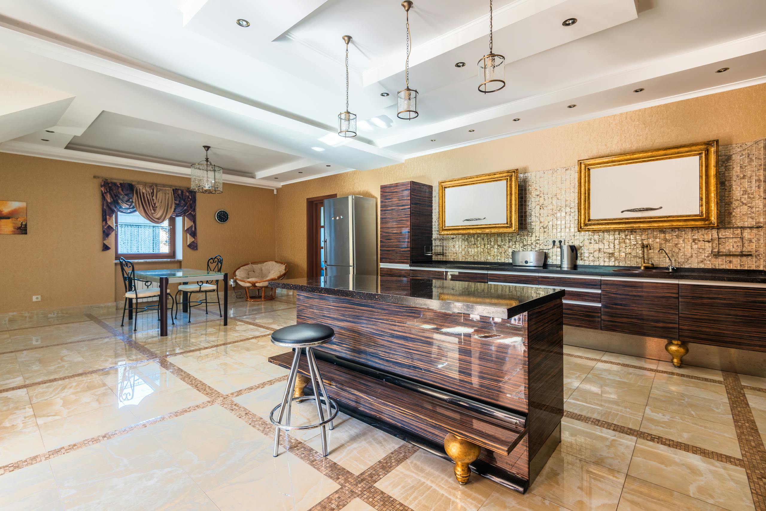 Spacious, elegant kitchen interior featuring modern design and luxury finishes.
